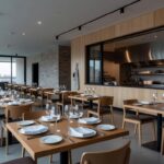 Restaurante de alta gastronomia vazio em São Paulo, simbolizando renúncia após denúncias de agressões no Noma.